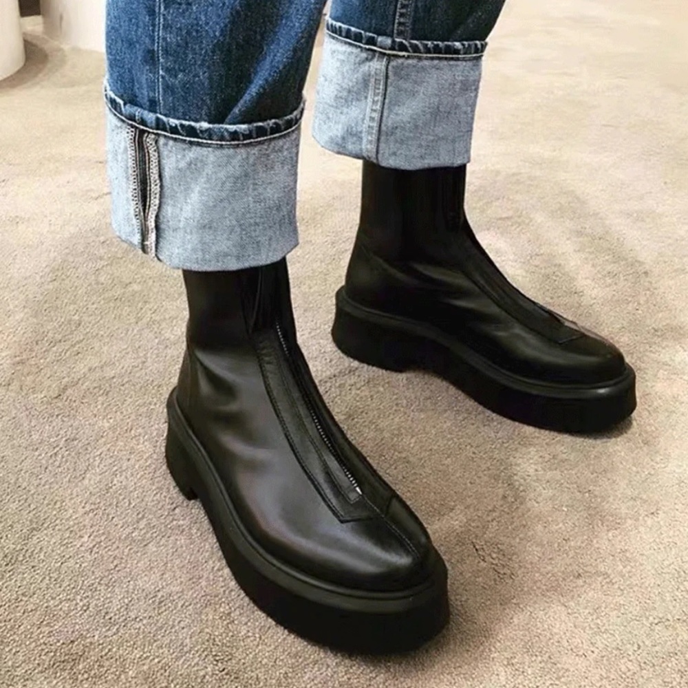 Black zip front boots. Fits size 8 / 8.5. Resemble The Row.